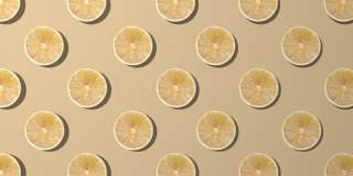 黄色背景上的柠檬片纺纱图案