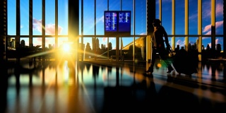 年轻女子的剪影与手提箱走在机场对美丽的日落，高清