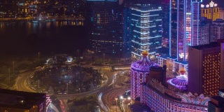 夜晚照亮澳门城市景观交通街道屋顶全景4k时间推移中国
