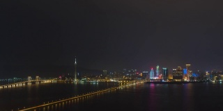 night illuminated macau cityscape traffic bridge rooftop panorama 4k timelapse china