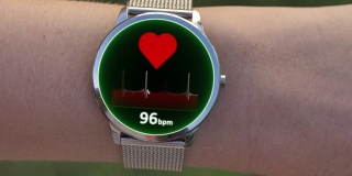 智能手表上的心跳或脉搏跟踪器。健康应用和绿色屏幕