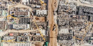 T/L Aerial View of Working Construction site