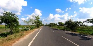 tarmac road clip with amazing blue sky taken form fast moving vehicle video