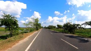 tarmac road clip with amazing blue sky taken form fast moving vehicle video视频素材模板下载