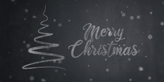 手绘圣诞快乐的文字与圣诞树在黑板上