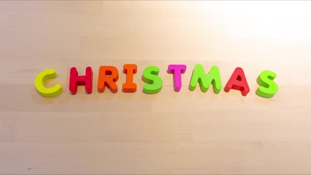 圣诞快乐文字定格动画，跳跃文字为节日概念
