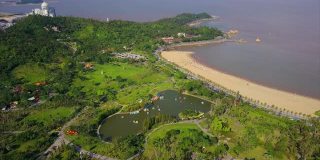 白天珠海市景著名的渔女纪念碑湾航拍俯视图4k中国