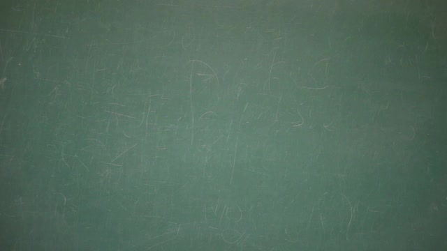 在学校的黑板上手写课文LESSON