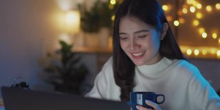 Asian teenage university student girl learning online class late night at home