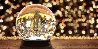 玻璃雪花球与飞舞的雪花背景圣诞灯
