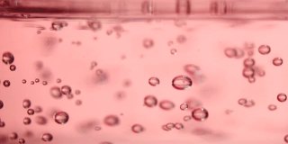 特写粉红玫瑰花透明质酸透明液凝胶