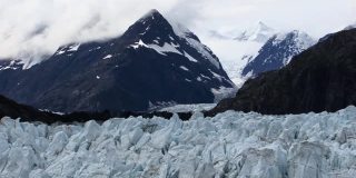 Margerie Glacier and the snowcapped mountains around it.
