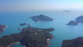 鸟瞰香港西贡万宜岛附近的山景视频素材模板下载