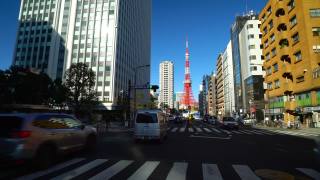 日本东京繁忙的街道和东京塔在远处。视频素材模板下载