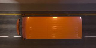 橙色的货车在一个照明隧道内移动