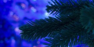 2021年新年和圣诞节背景。圣诞树的树枝旋转。景深浅。摄像机的运动。3 d渲染动画