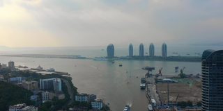 日落时分海南岛三亚湾著名酒店航拍全景4k中国