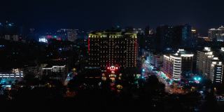 夜间照明海南岛三亚市航拍全景4k中国