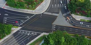 海南三亚滨江交通街道十字路口高空俯视图4k中国