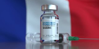 COVID-19疫苗和法国旗注射器，可循环使用