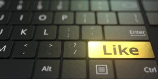 黑色的电脑键盘和金色的按键