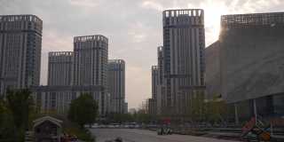 日落时分南京城现代住宅公寓综合体交通街道慢镜头全景4k中国