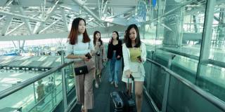 亚洲女性在机场行走的慢镜头