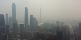 晴朗的雾霾广州市区交通街道航拍全景4k中国