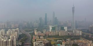 阳光明媚的一天广州市区交通大桥著名的塔，河边航拍全景4k中国