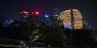 杭州市区夜景时间照亮了中国著名的现代建筑广场全景4k
