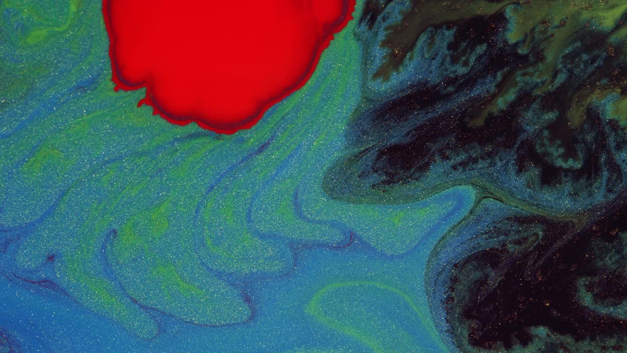 水晶发芽。在暗蓝色背景上的抽象红点。抽象的垃圾艺术，墨水颜料扩散爆炸的背景。