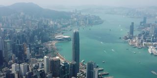 日间飞行飞越香港市区维多利亚港市区交通全景4k