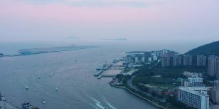 日落天空海南岛著名的三亚凤凰酒店空中全景4k中国