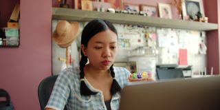 亚洲女性喜欢在下班后在家办公时吃甜甜圈和喝水。工作时要注意休息，以免造成太大的压力