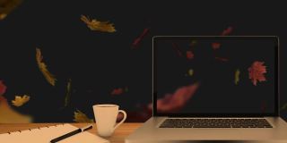 桌面电脑和办公设备放在一张桌子上，背景映衬着秋天的枫叶