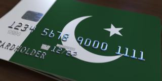 带有巴基斯坦国旗的塑料银行卡。巴基斯坦国家银行系统相关动画