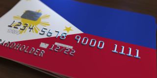 带有菲律宾国旗的塑料银行卡。国家银行系统相关动画