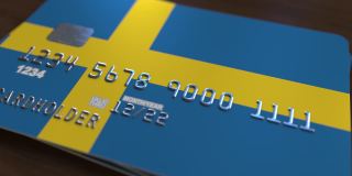 带有瑞典国旗的塑料银行卡。国家银行系统相关动画