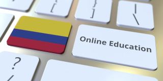 电脑键盘上的在线教育文本和哥伦比亚国旗。现代专业培训相关概念3D动画