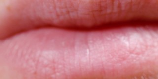 MACRO, DOF:女性美丽健康的嘴唇的高清晰度特写。