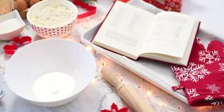 为准备传统自制圣诞姜饼饼干的杂货和食谱书