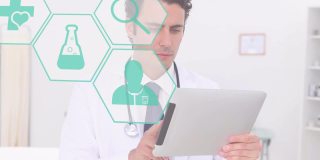 数字组成的多个医疗图标对抗白人男性医生使用数字平板电脑