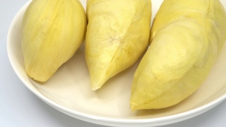 榴莲流行泰国热带传统水果美味，榴莲水果放在白色盘子里。视频素材模板下载