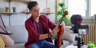 音乐家正在制作一个关于小提琴的视频博客