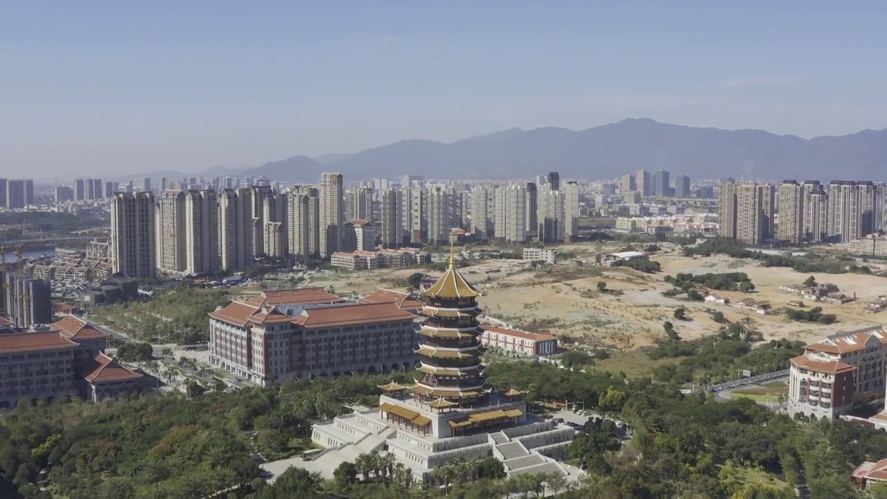 航拍现代城市中具有中国特色的古塔