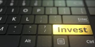 黑色电脑键盘和金色投资键