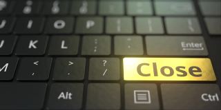 黑色的电脑键盘和金色的关闭键