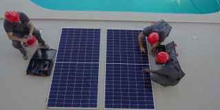 多种族同事安装太阳能电池板