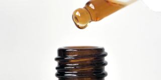 滴管血清棕油，医疗保健药学医学概念。