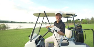 亚洲男子高尔夫球手在夏天阳光灿烂的一天高尔夫球场高尔夫的4K肖像。